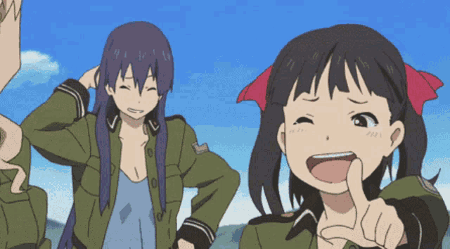 a girl with a red bow on her hair is smiling and pointing