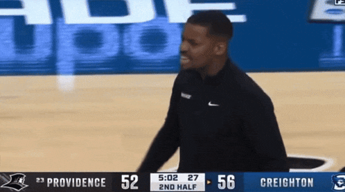 a basketball game is being played between providence and creighton