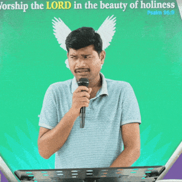 a man speaking into a microphone in front of a sign that says psalm 96:9
