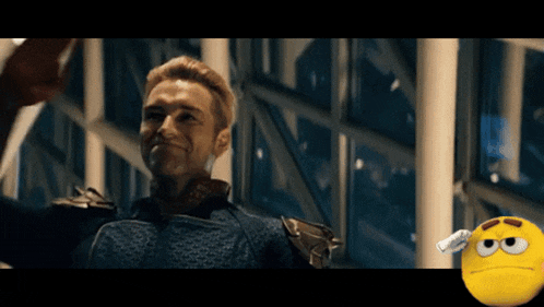 a man in a superhero costume is smiling next to a smiley face