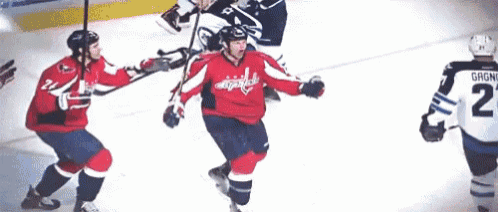 a hockey player wearing a jersey that says washington on it
