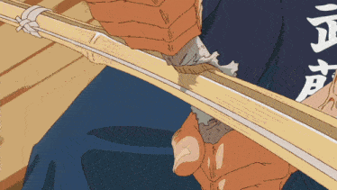 a drawing of a person holding a sword with chinese writing