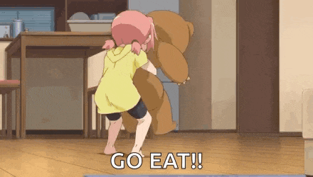 a girl is hugging a teddy bear in a living room and says `` go eat '' .
