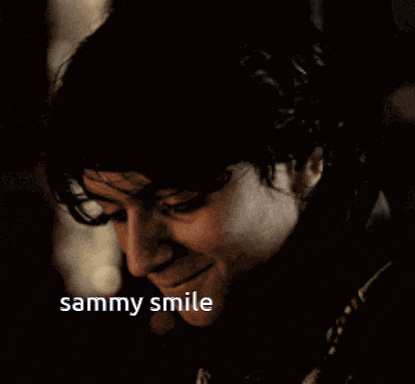 a close up of a person 's face with the words sammy smile on the bottom right