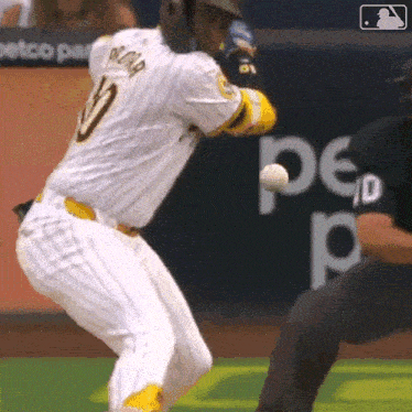 a baseball player with the number 10 on his jersey is swinging at a ball