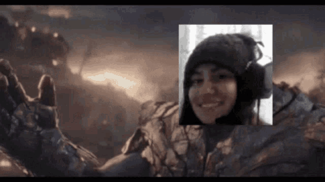a woman wearing a green hat and headphones is smiling in a video game