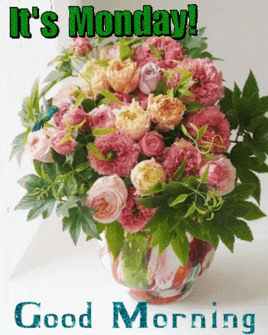 a bouquet of flowers in a vase with the words it 's monday