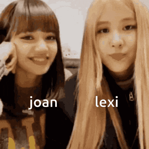 joan and lexi are standing next to each other and smiling for the camera
