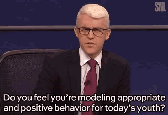 a man in a suit and tie is asking if he is modeling appropriate and positive behavior for today 's youth
