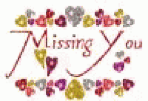 a picture of a missing you sign with hearts and flowers .