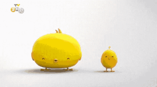 two yellow chickens are standing next to each other on a white background with a tv logo in the background