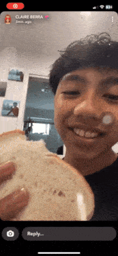 a young man is holding a slice of bread in front of his face with claire berra written on the bottom right