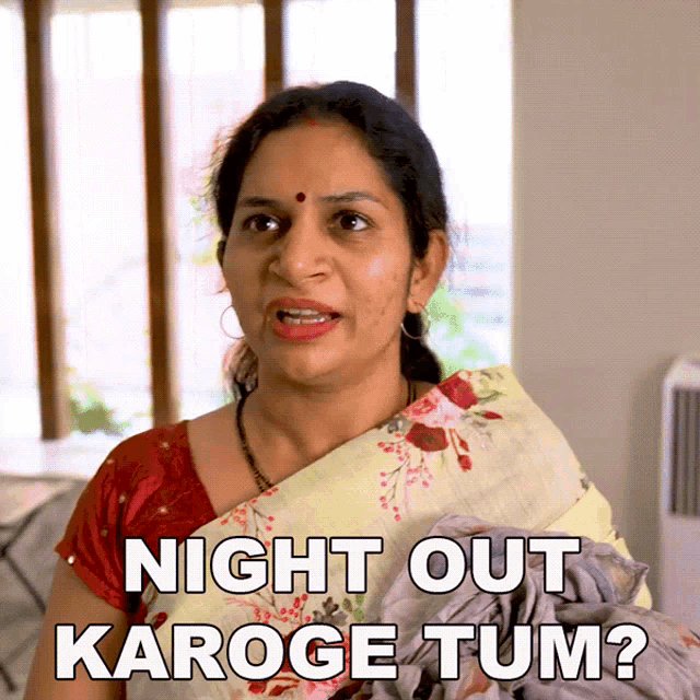 a woman says night out karoge tum while holding a pile of clothes