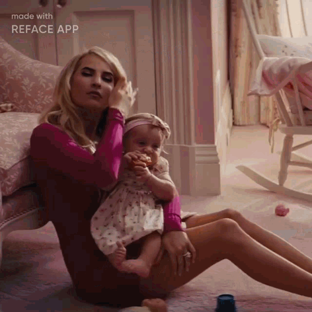a woman is sitting on the floor holding a baby and the words made with reface app are visible