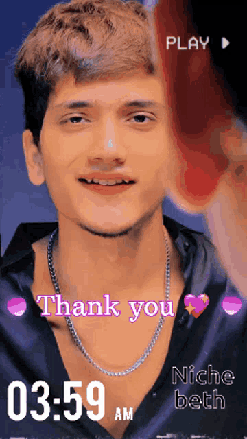a picture of a man with a necklace and the words thank you on it