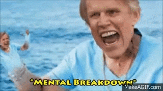 a man in a blue shirt is screaming in front of a body of water with the words mental breakdown written above him .