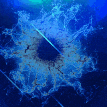 a blue background with a hole in the middle of it