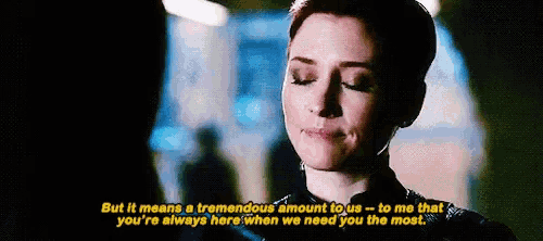 a woman with short hair is smiling and says but it means a tremendous amount to us
