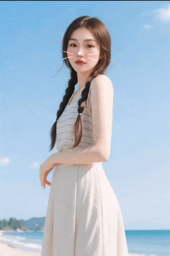 a girl with pigtails and a pink heart on her nose