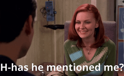 a man and a woman are looking at each other and the woman says " h-has he mentioned me ? "