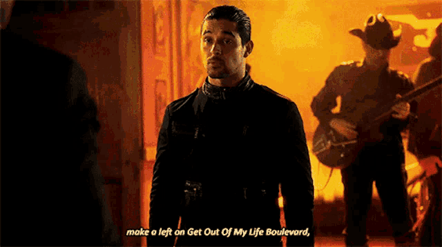 a man says make a left on get out of my life boulevard in front of a fire