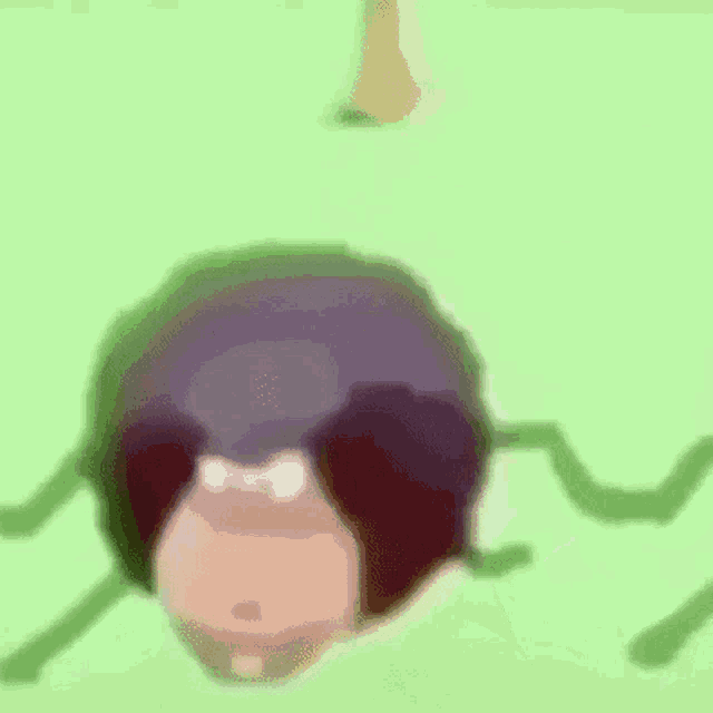a close up of a cartoon character with a purple head and green legs .