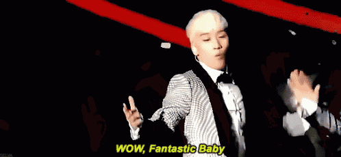 a man in a suit and tie is saying wow fantastic baby