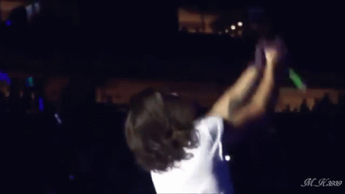 Harry Styles Spitting GIF - Rock On Spit Concert GIFs