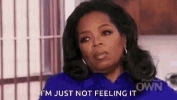 oprah winfrey is sitting in front of a window and says i 'm just not feeling it .