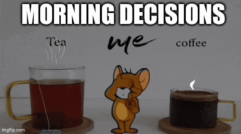jerry from tom and jerry is standing next to two cups of coffee and tea .