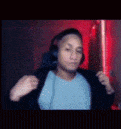 a blurry picture of a person wearing headphones