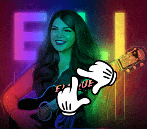 a woman holding a guitar with a mickey mouse hand pointing to her