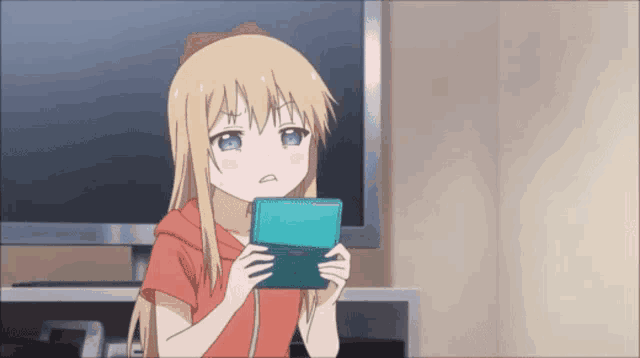 a blonde anime girl is holding a blue nintendo 3ds