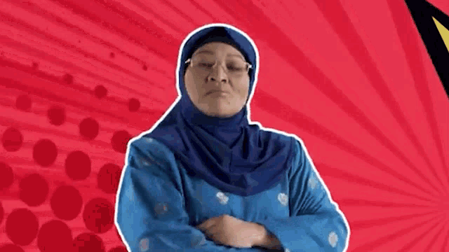 a woman wearing a hijab and glasses is making a funny face .