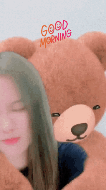 a woman is hugging a teddy bear with the words " good morning " written above her