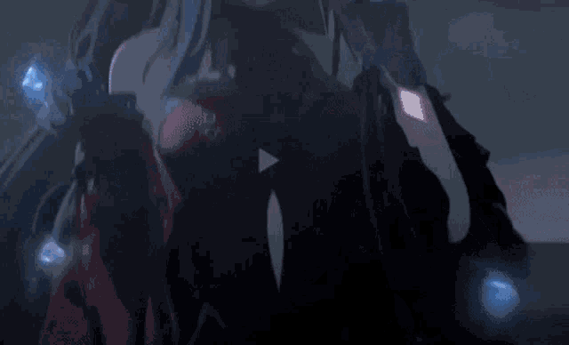 a girl with long black hair and red eyes is wearing a witch hat and holding a knife .