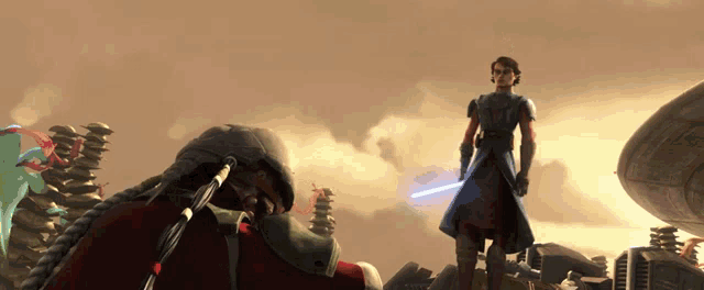 a man in a blue robe is holding a light saber and standing next to another man