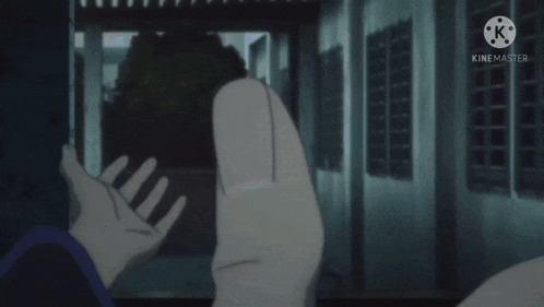 a person making a hand gesture with the words demon dogs below