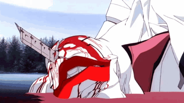 a person with a knife in their mouth and blood coming out of their mouth