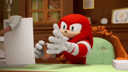 knuckles the echidna from sonic the hedgehog is sitting at a desk with a piece of paper in his hand .