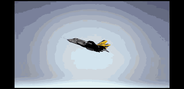a black and yellow fighter jet is flying through a clear blue sky