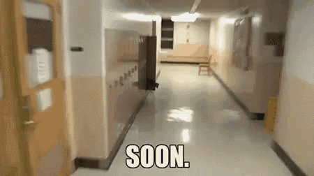 a long hallway with the words soon on the floor
