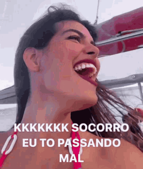 a woman in a red bikini is laughing with the words kkkkkk socorro eu to passando mal on the bottom