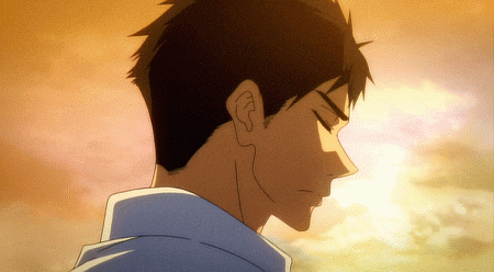 a close up of a man 's face with the sun shining behind him
