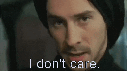 a close up of a man 's face with the words i don 't care .