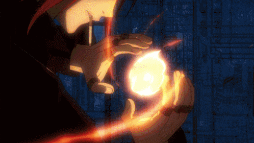 a close up of a person holding a ball of fire