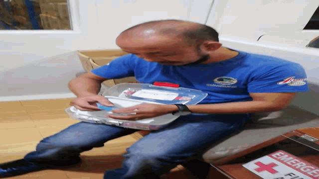Fred First Aid Kit GIF - Fred First Aid Kit Checking GIFs