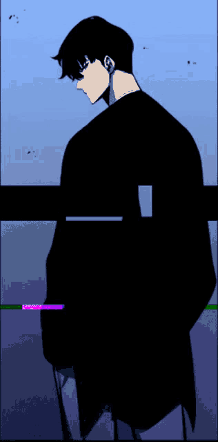 a man in a black jacket is standing in front of a blue background