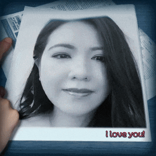 a woman 's face is on a piece of paper with the words i love you