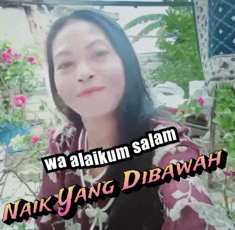 a picture of a woman with the words wa alaikum salam naik yang dibawah on it
